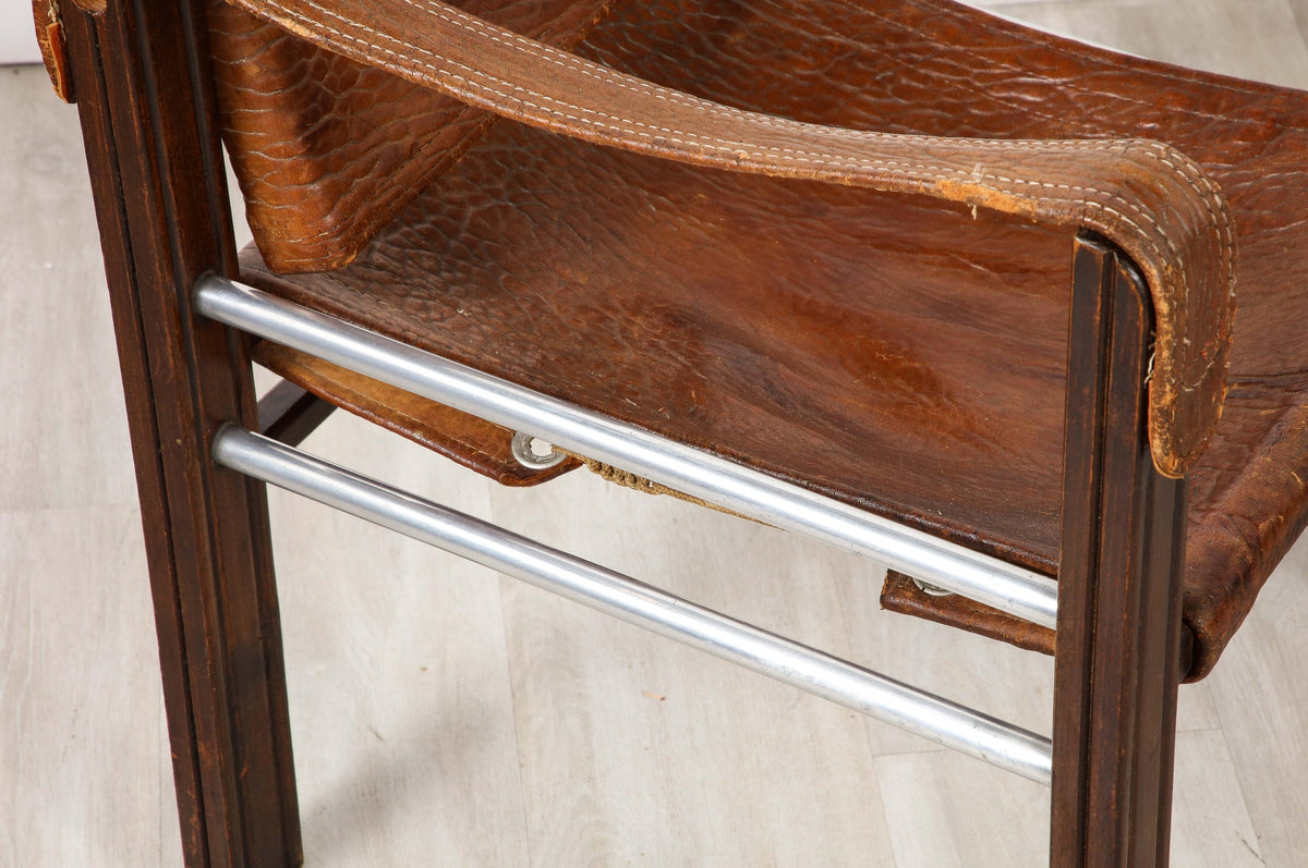 Pair of Spanish 1920's Pebbled Leather and Chrome Safari Armchairs