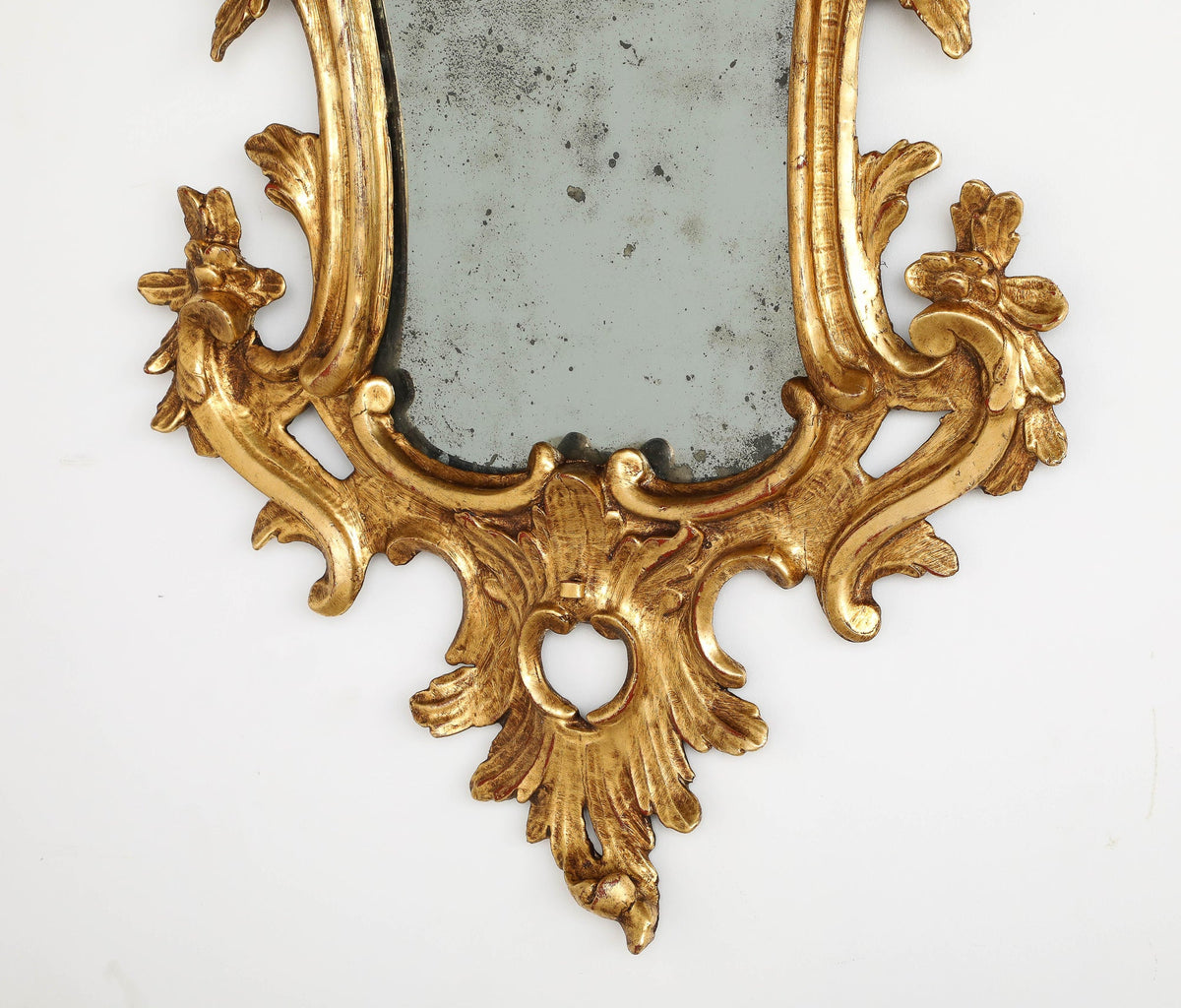 Pair of Italian Eighteenth Century Rococo Carved and Gilded Wood Mirrors