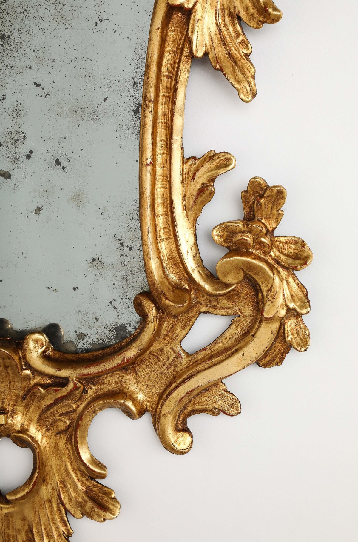 Pair of Italian Eighteenth Century Rococo Carved and Gilded Wood Mirrors