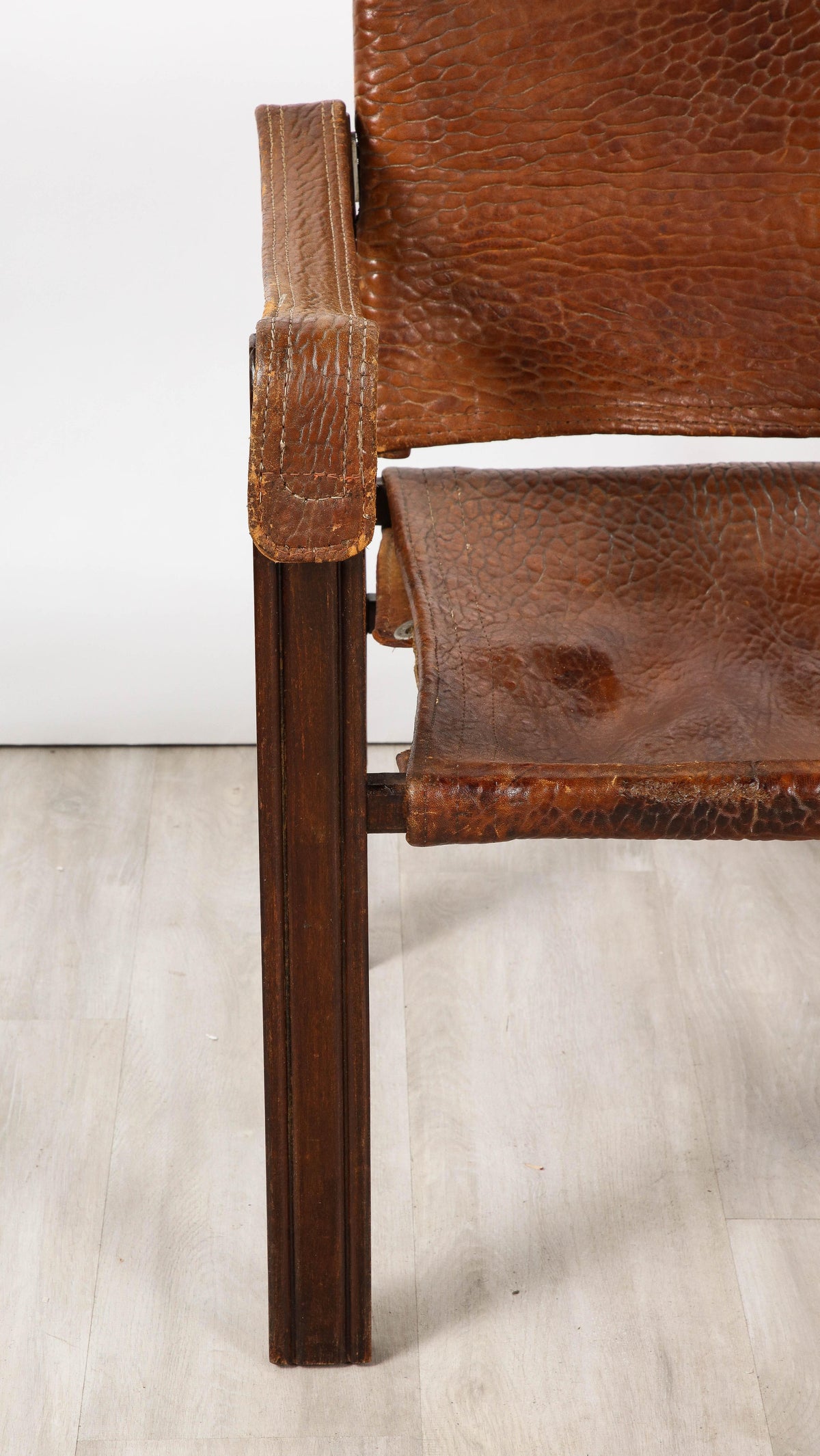 Pair of Spanish 1920's Pebbled Leather and Chrome Safari Armchairs